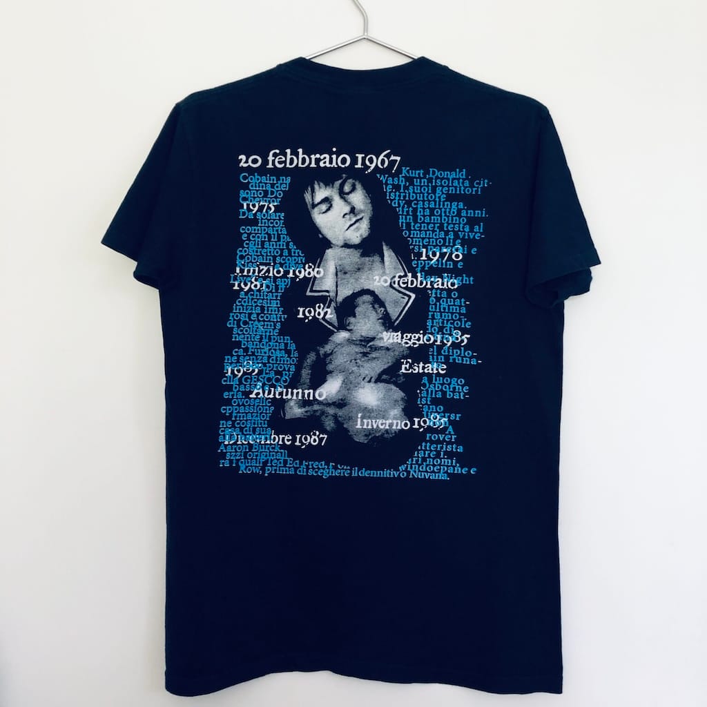 Back of Nirvana tee with Italian text Kurt Cobain timeline