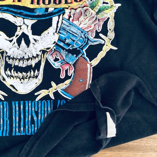 Gildan printed tag with Made in Haiti label on GNR shirt