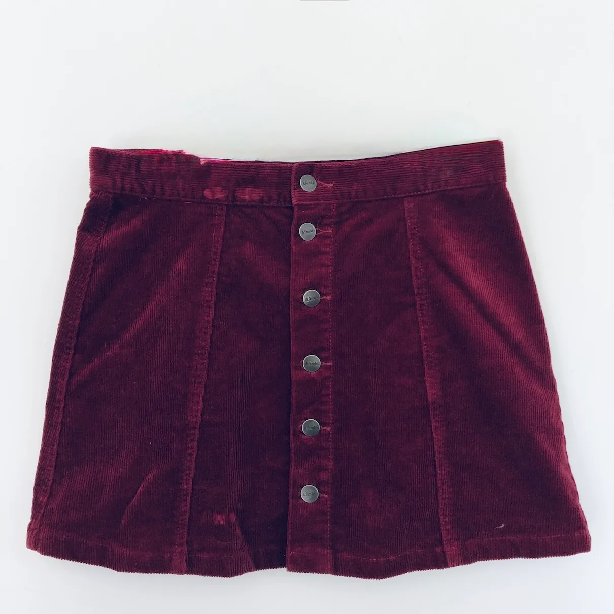 wine red mini skirt, Afends corduroy skirt, vintage-inspired mini, burgundy button skirt