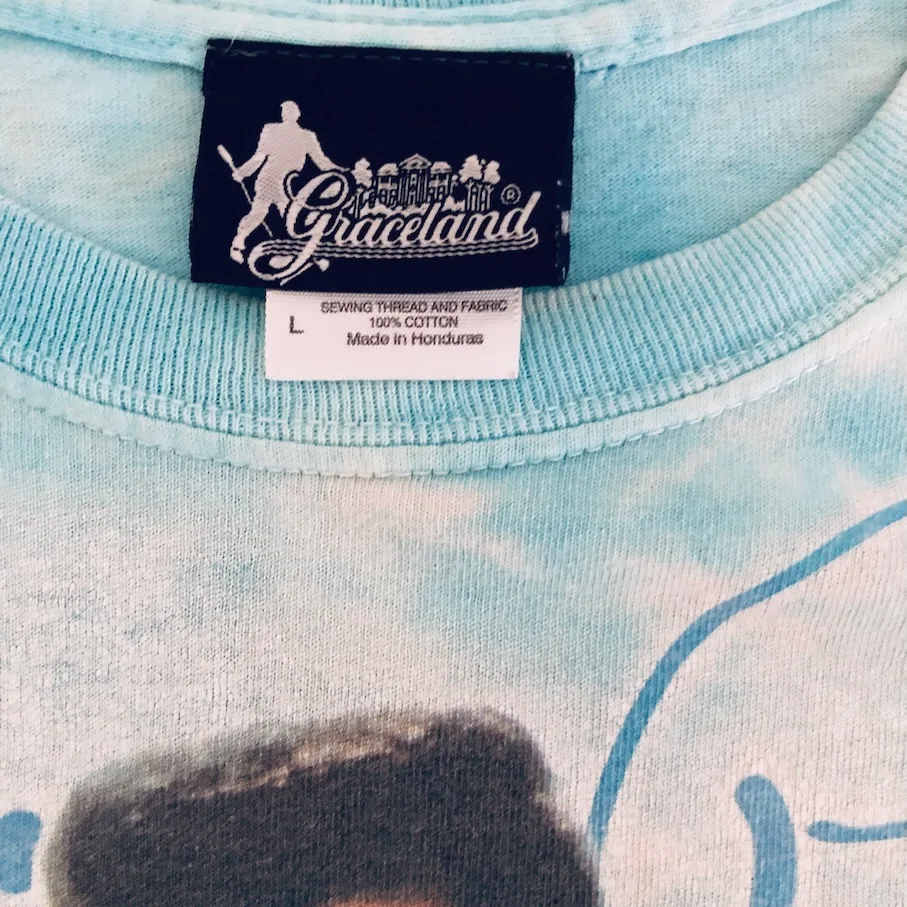 Elvis Presley Graceland tag close-up with copyright